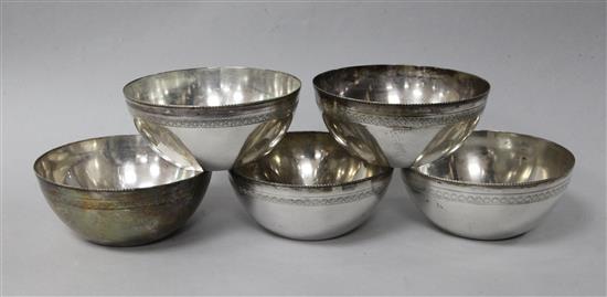 A set of five Egyptian engraved silver bowls, 17 oz.